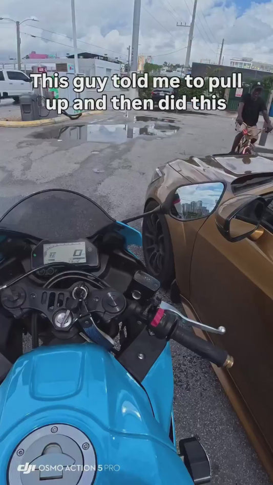 Biker Has Funny Interaction with Driver