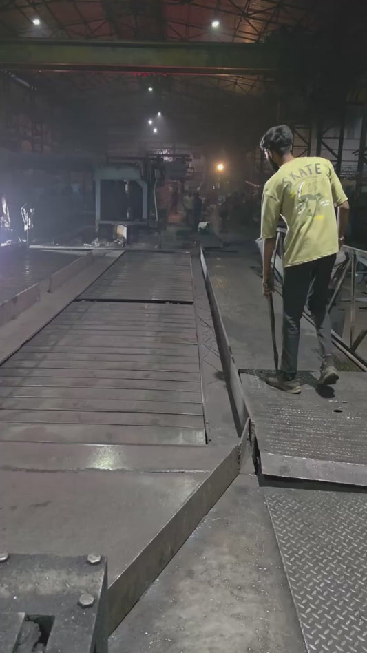Worker Skillfully Handles Red-Hot Steel Strip (2)