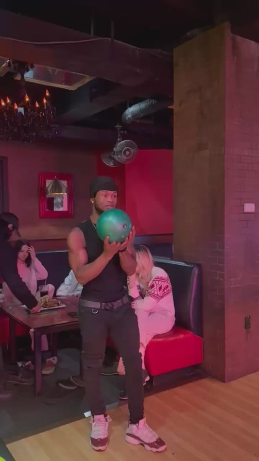 Man Demonstrates Incredible Flexibility While Bowling