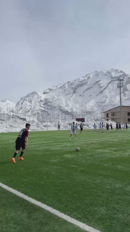 Incredible Free Kick Goal in Front of Scenic Mountain