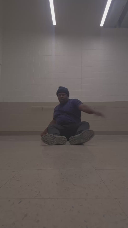 Man Uses Jump Rope While Seated