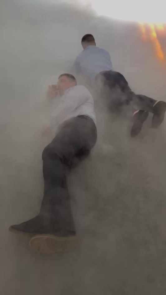 Guys Have Fun with Thick Smoke at a Wedding