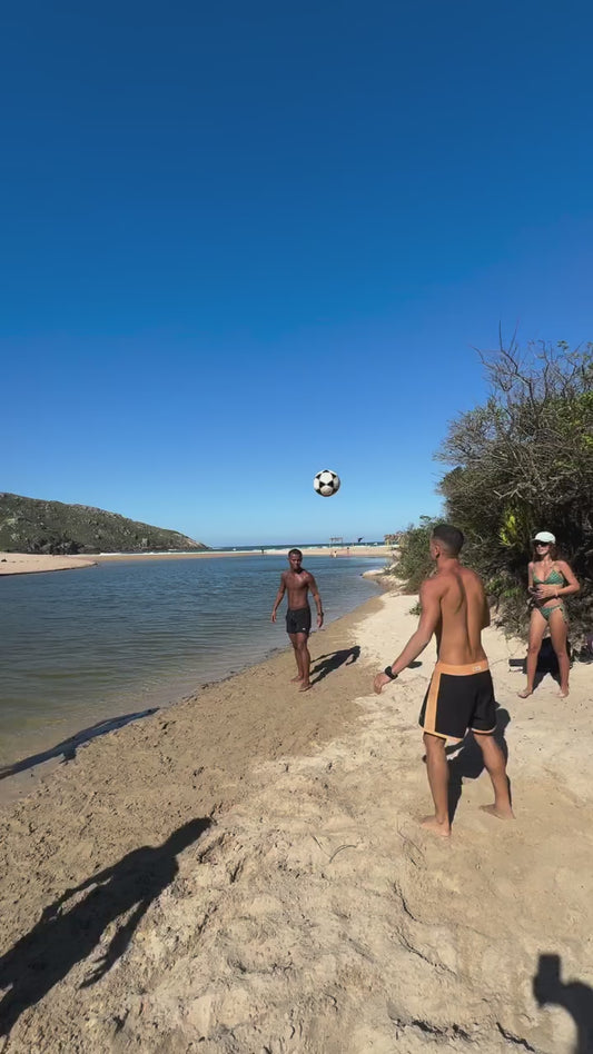 High Skill Game of 'Altinha' on Beach in Brazil