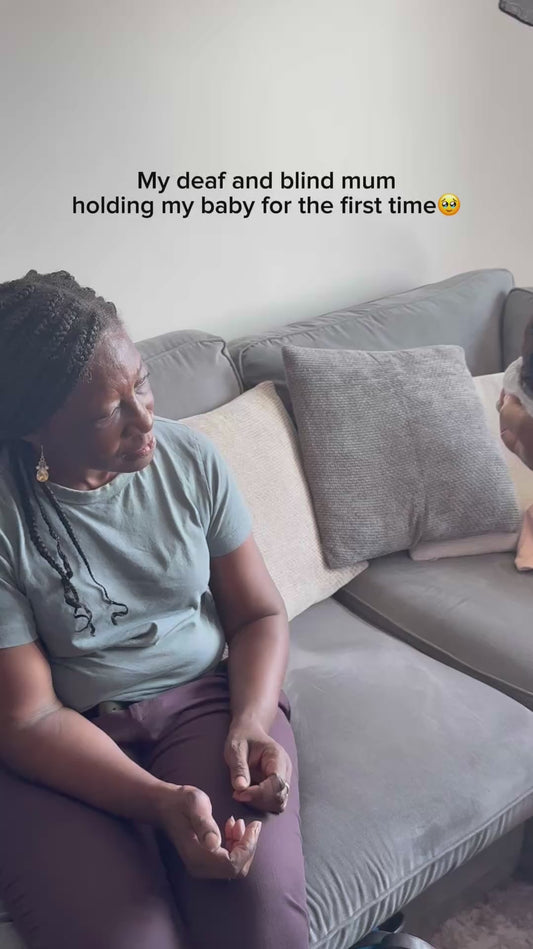 Deaf and Blind Woman's First Time Holding Newborn Grandchild