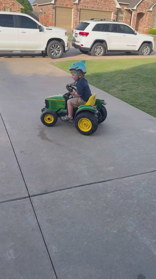 Man Boosts His Son's Toy Tractor
