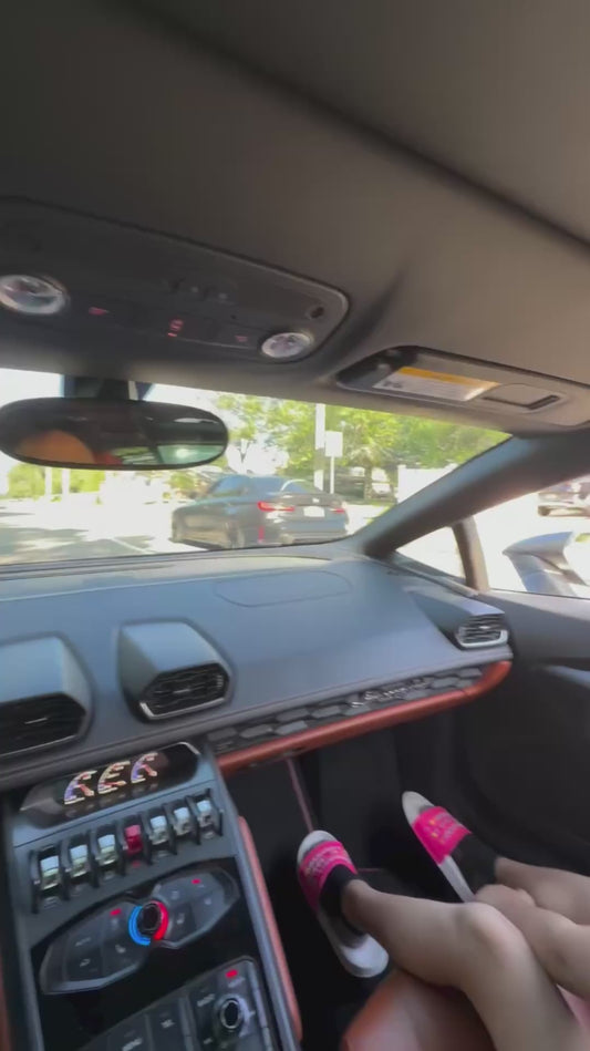Little Girl Enjoys the Ride as Her Parents Race Their Cars