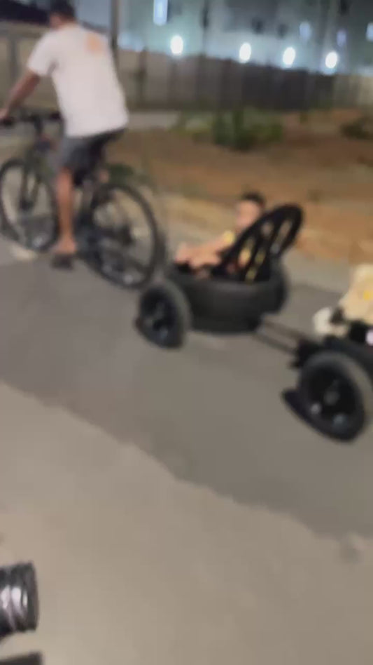 Dad Bikes His Kid and Their Dog Around in the Cutest Homemade Cart Train
