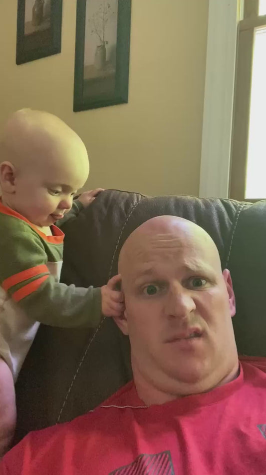 Baby Plays Strangely with Dad's Head