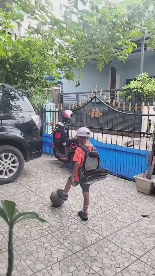 Kid Shows Impressive Football Skills Before Dancing in Celebration