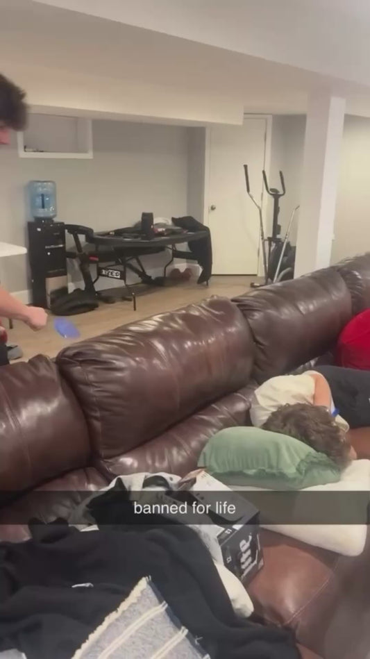 Guys Break a Hole in the Wall During Fly Swatter Fight