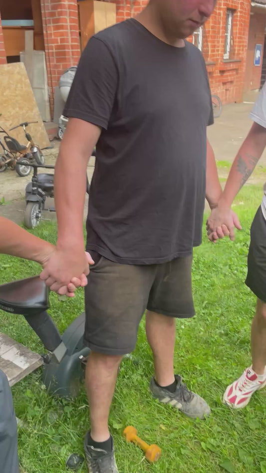 Cat Joins a Group of Friends in Holding Hands to Form a Circle