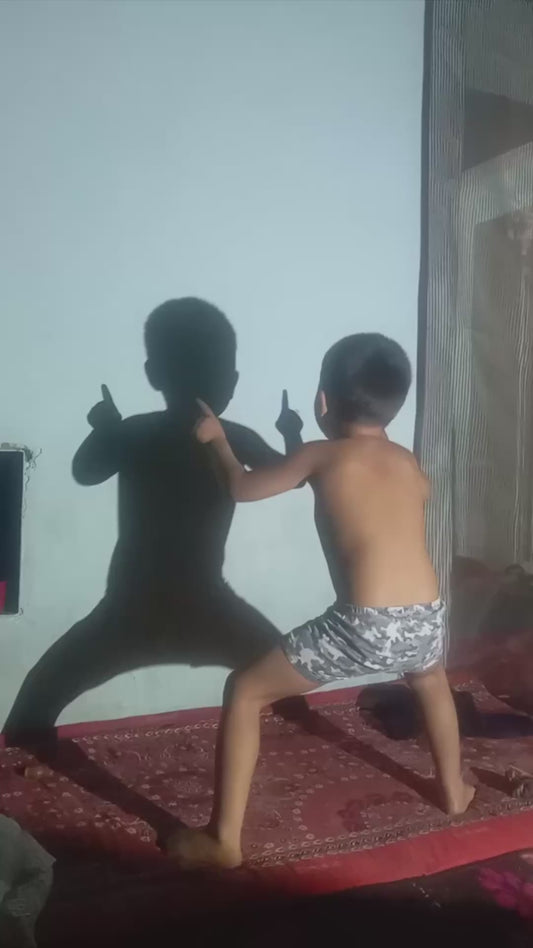Cool Light Trick Makes Boy's Shadow Appear to be Dancing