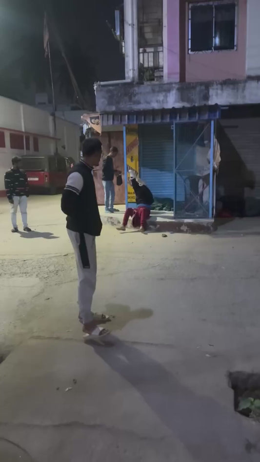 Guy Wears Shoes on Hands and Hoodie on Legs to Create Handstand Walking Illusion