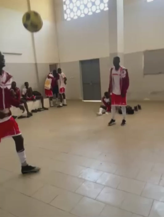 Two Football Players Show Incredible Skill in Locker Room Juggling