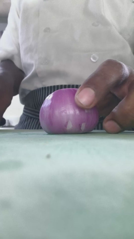 Chef Expertly Dices Onion Into Small Pieces