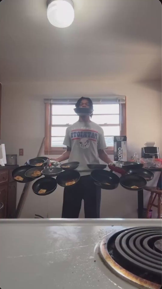 Man Flips 17 Eggs Simultaneously