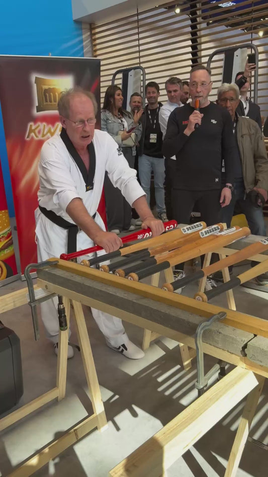 Mr Hammerhand Breaks as Many Baseball Bats as Possible in 30 Seconds