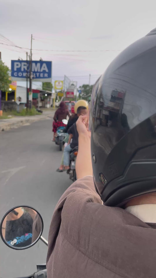 Guy Gets Flipped Off by Kid on Back of Bike