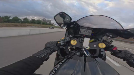 Biker Has Close Call While Going Extremely Fast
