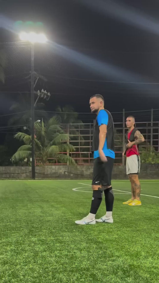 Guy Plays Football with a Gun in His Sock