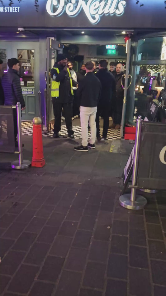 Two Guys Get Into a Fight With Bouncers Outside a Bar