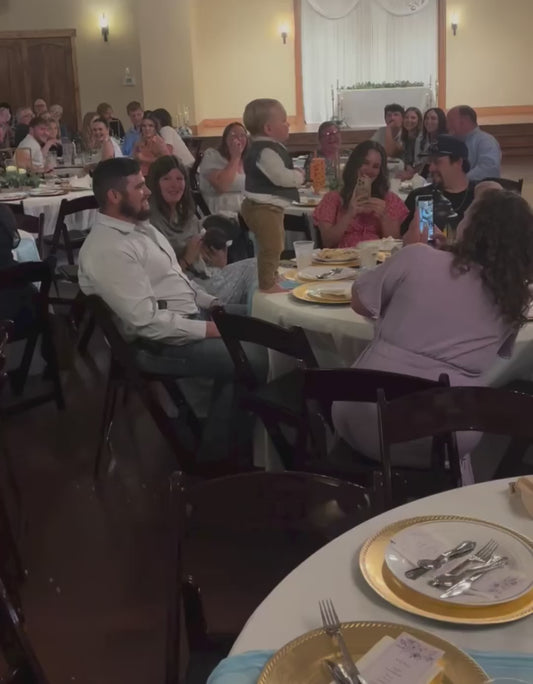 Baby Dances on a Table at a Wedding