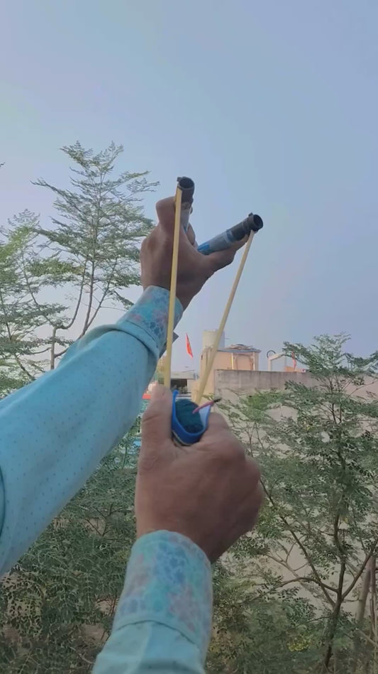 Guy Sets Off a Firework Using a Slingshot