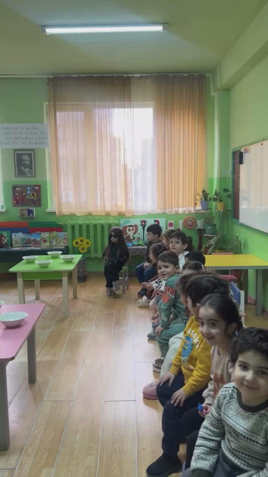 Extremely Cool Little Girl Sitting in Class