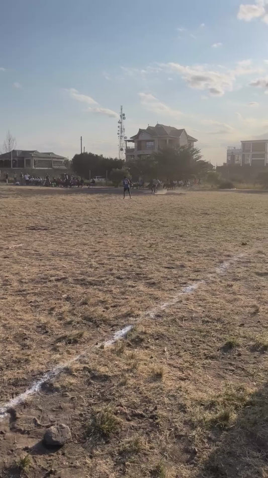 Football Player Scores Incredible Volley Following Throw-in