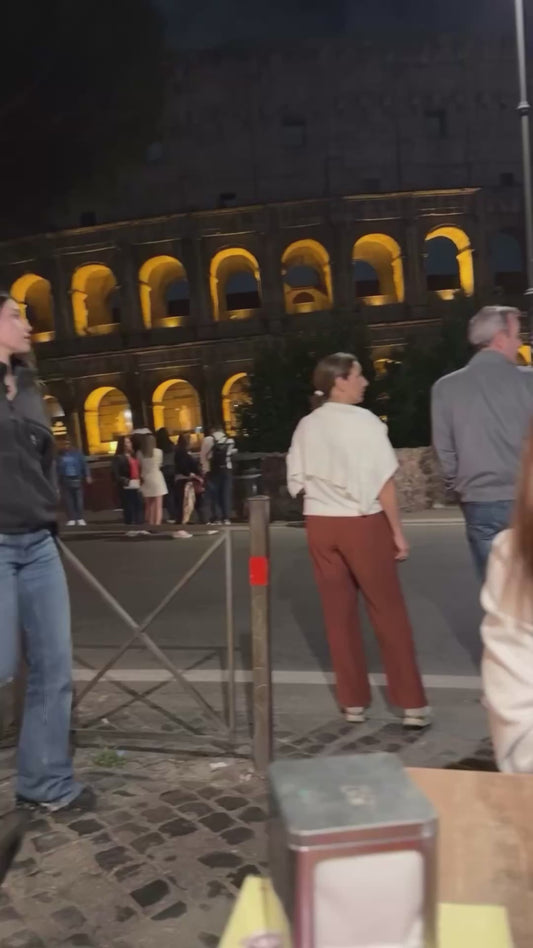 Rat Enjoys the Smell of Food While Watching Over Restaurant in Rome