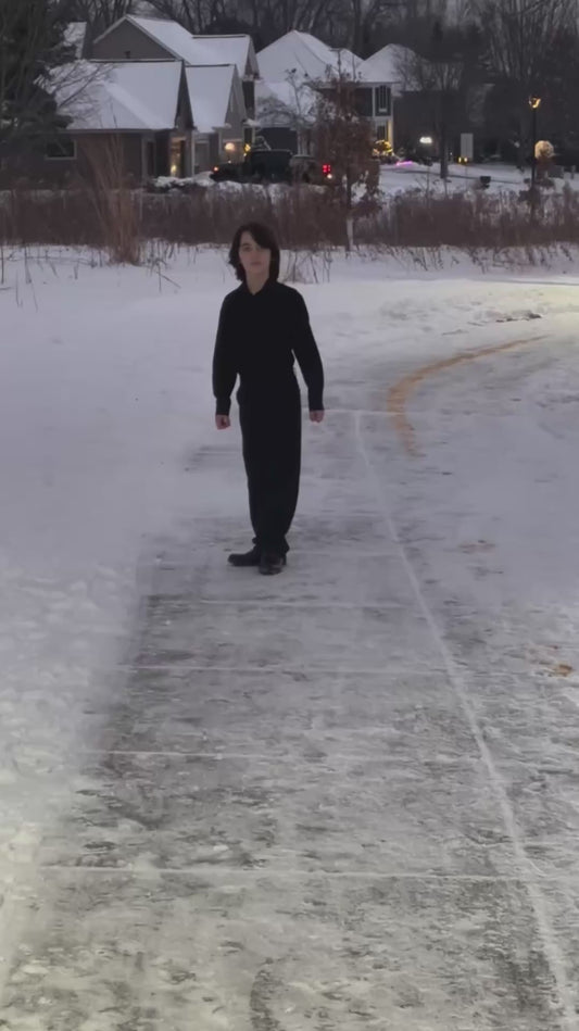 Kid Walks Up to the Camera and Strikes a Pose