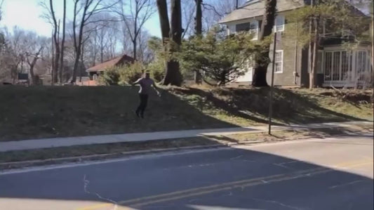 Man Performs Impressive Backflip Over Car Trunk