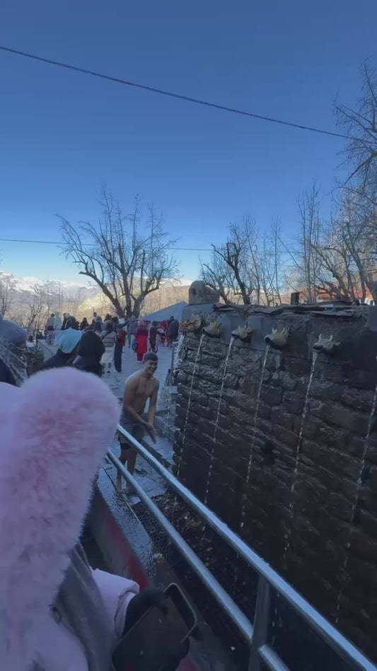 Man Runs Through Freezing Temple Fountains Before Plunging Into Ice-Cold Pool