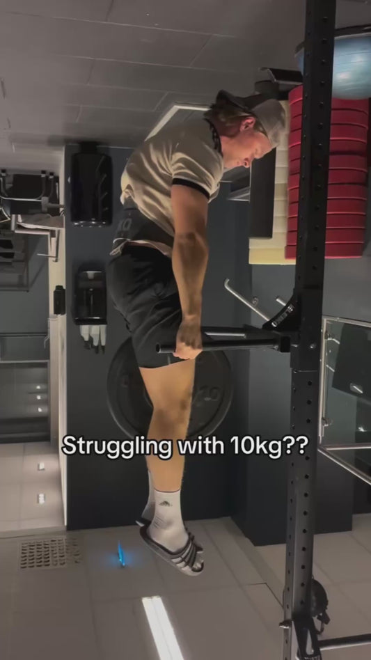Guy Does Upside Down Weighted Tricep Dips