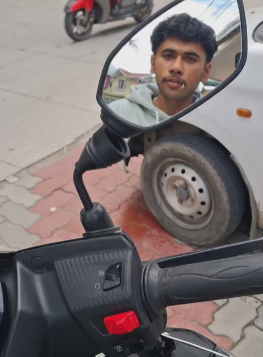 Biker Makes Side Mirror Appear to be Touchscreen