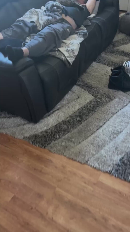 Cat Lies On Top of Owner Who Fell Asleep Watching TV