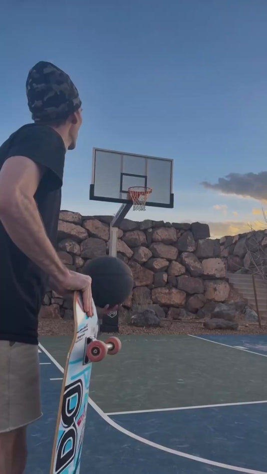 Man Pulls Off Incredible Kickflip Dunk