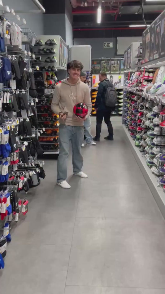 Guy Shows Off Incredible Football Skills in a Store