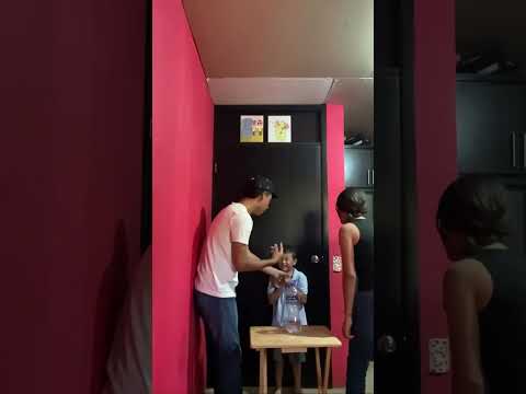 Three Siblings Play Bottle Flip Game with Brutal Forfeit