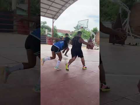 Basketball Player Dribbles Past Defenders and Scores Brilliant Basket